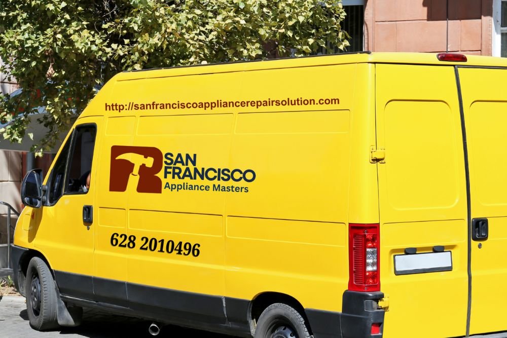 A yellow van stationed on the street, representing appliance repair services in San Francisco, California.